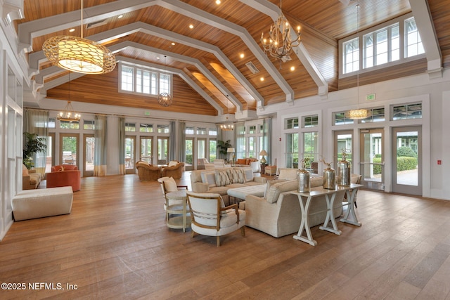 275 Kellet Way, Saint Johns, FL 32259 - living room with high vaulted ceiling, a chandelier, and wood-type flooring