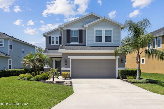 219 Heron Landing Rd, Saint Johns, FL 32259 - view of front facade featuring a garage, driveway, a front yard, and stucco siding