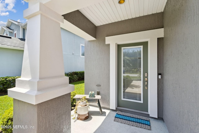 219 Heron Landing Rd, Saint Johns, FL 32259 - doorway to property featuring stucco siding