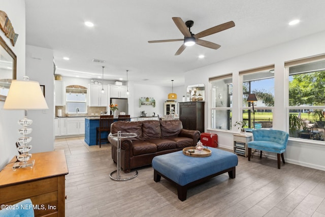 219 Heron Landing Rd, Saint Johns, FL 32259 - living area featuring a ceiling fan, light wood-style flooring, and recessed lighting
