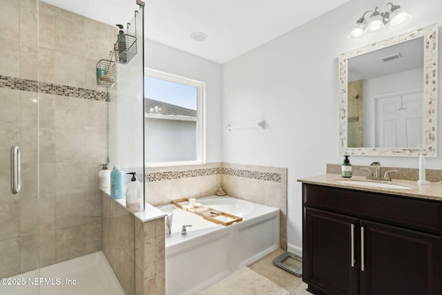 219 Heron Landing Rd, Saint Johns, FL 32259 - full bathroom with a shower stall, a bath, vanity, and tile patterned floors