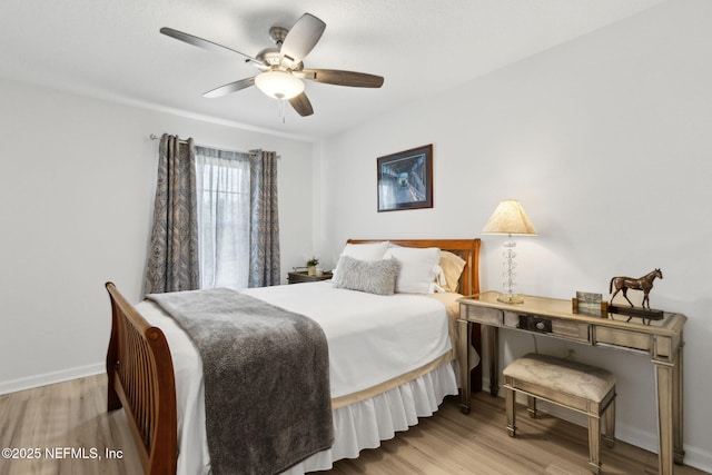 219 Heron Landing Rd, Saint Johns, FL 32259 - bedroom with wood finished floors, baseboards, and ceiling fan