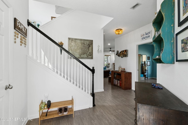 219 Heron Landing Rd, Saint Johns, FL 32259 - foyer entrance with wood finished floors, stairway, a ceiling fan, and baseboards