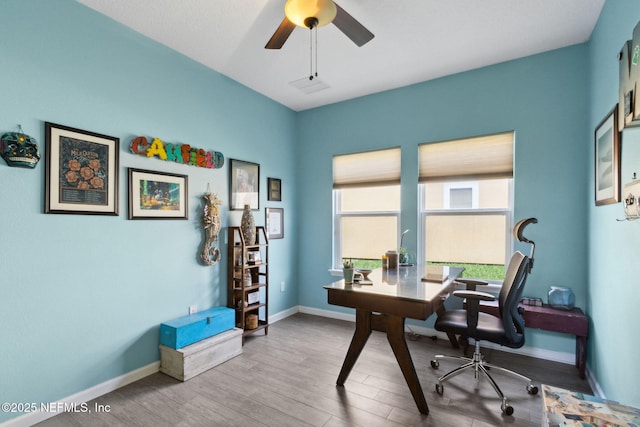 219 Heron Landing Rd, Saint Johns, FL 32259 - office featuring wood finished floors, ceiling fan, and baseboards