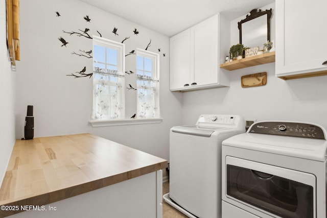 219 Heron Landing Rd, Saint Johns, FL 32259 - washroom with cabinet space and separate washer and dryer