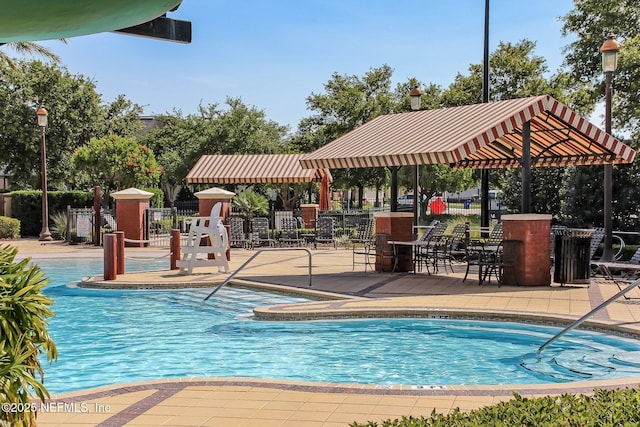 219 Heron Landing Rd, Saint Johns, FL 32259 - community pool with a patio area