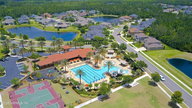 219 Heron Landing Rd, Saint Johns, FL 32259 - aerial perspective of suburban area featuring a pool, a nearby body of water, and a forest