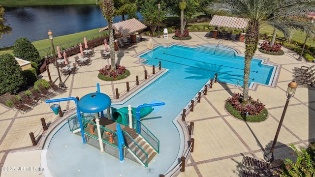 219 Heron Landing Rd, Saint Johns, FL 32259 - community pool with a water slide, a patio, a gazebo, and a water view