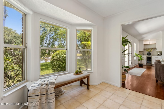 1553 Royal Fern Ln, Fleming Island, FL 32003 - sitting room with wine cooler, healthy amount of natural light, and light tile patterned floors