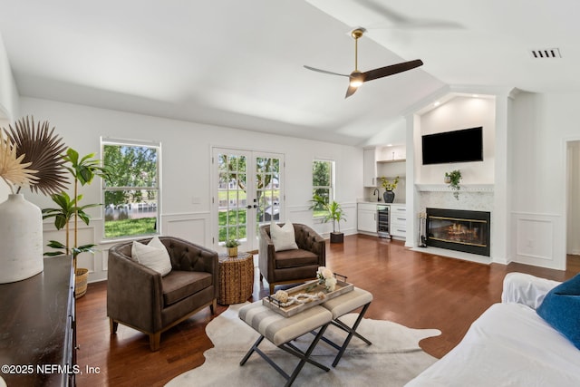 1553 Royal Fern Ln, Fleming Island, FL 32003 - living area with wine cooler, ceiling fan, healthy amount of natural light, dark wood-style floors, and vaulted ceiling