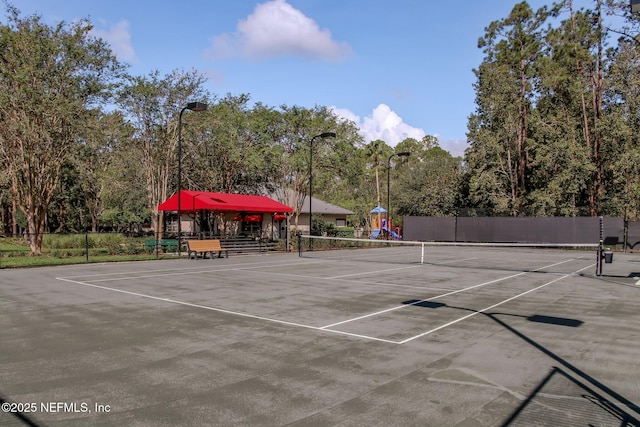 1553 Royal Fern Ln, Fleming Island, FL 32003 - view of tennis court with community basketball court