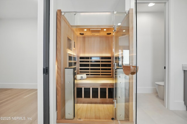 sauna featuring baseboards and recessed lighting
