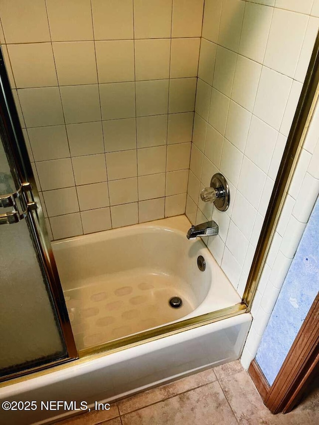 1734 Alps Ct, Fleming Island, FL 32003 - bathroom featuring tile patterned floors and enclosed tub / shower combo