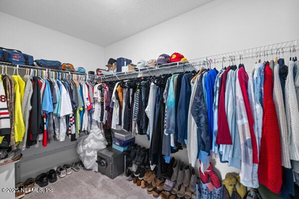2768 Windsor Lakes Way, Green Cove Springs, FL 32043 - walk in closet with carpet floors