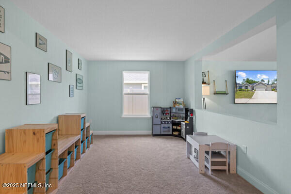 2768 Windsor Lakes Way, Green Cove Springs, FL 32043 - sitting room with baseboards and carpet