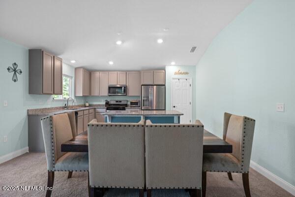 2768 Windsor Lakes Way, Green Cove Springs, FL 32043 - dining area with baseboards, light carpet, and recessed lighting