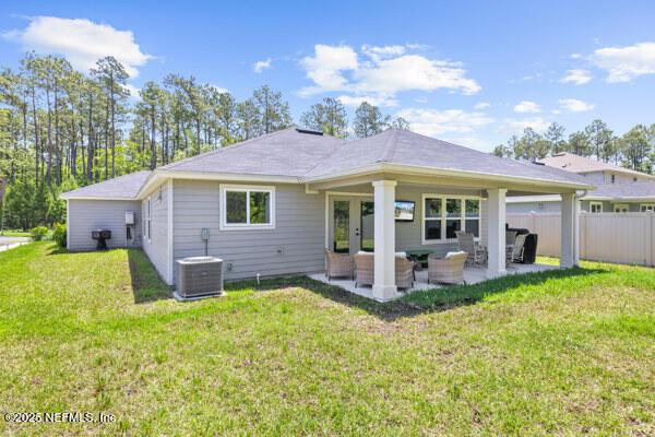 2768 Windsor Lakes Way, Green Cove Springs, FL 32043 - rear view of property with central AC unit and a patio