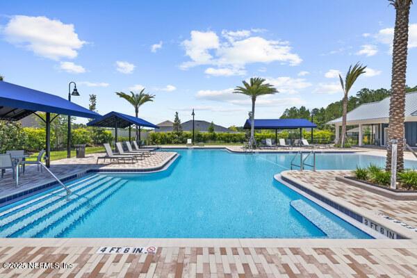 2768 Windsor Lakes Way, Green Cove Springs, FL 32043 - community pool featuring a patio