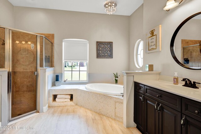 3854 Painted Bunting Way, Jacksonville, FL 32224 - bathroom with vanity, a stall shower, and a bath