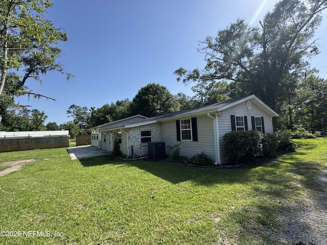 54038 Charles St, Callahan, FL 32011 - rear view of property featuring stone siding
