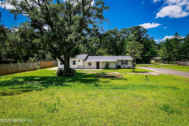 54038 Charles St, Callahan, FL 32011 - view of front facade with driveway and brick siding