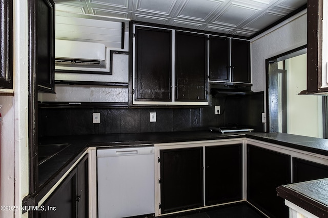 54038 Charles St, Callahan, FL 32011 - kitchen with dishwasher, dark cabinetry, dark countertops, and an ornate ceiling