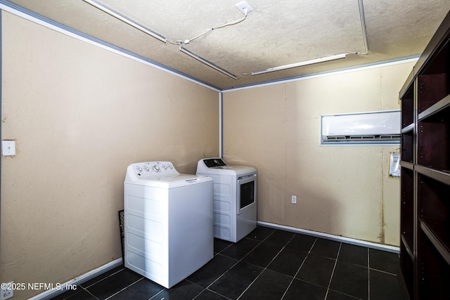 54038 Charles St, Callahan, FL 32011 - laundry room featuring washer and clothes dryer, a wall unit AC, and dark tile patterned flooring