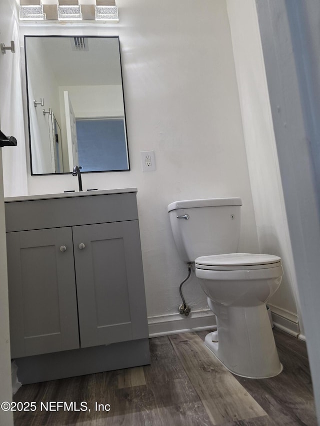 54038 Charles St, Callahan, FL 32011 - bathroom with wood finished floors and vanity