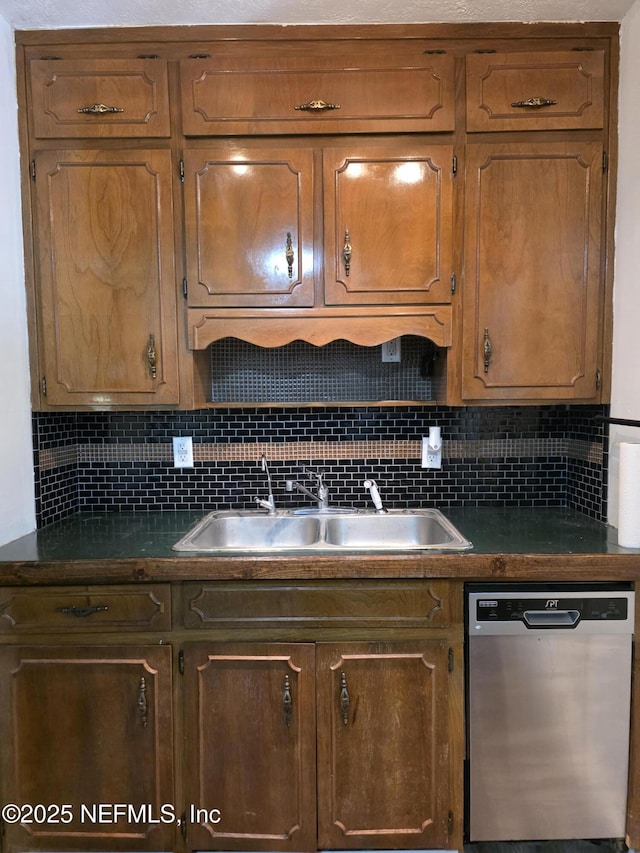 54038 Charles St, Callahan, FL 32011 - kitchen with dishwasher, dark countertops, and decorative backsplash