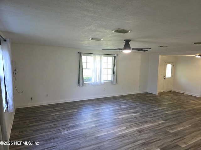 54038 Charles St, Callahan, FL 32011 - unfurnished room featuring ceiling fan, wood finished floors, and a textured ceiling