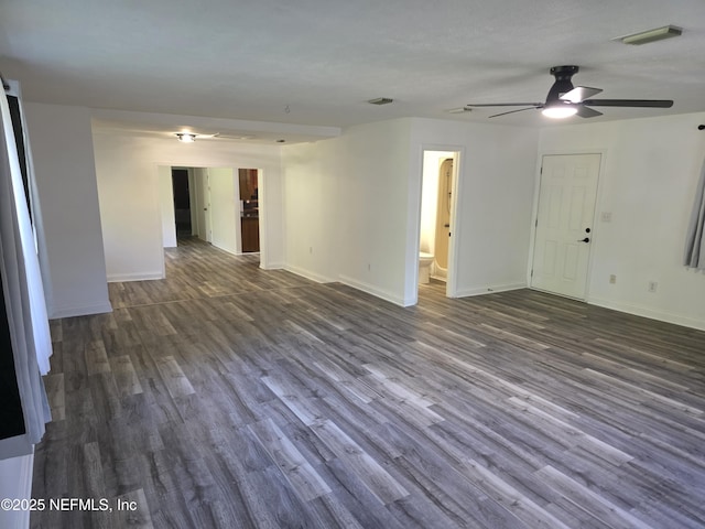54038 Charles St, Callahan, FL 32011 - unfurnished living room with dark wood finished floors and ceiling fan