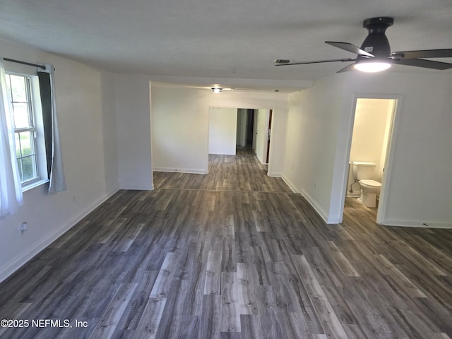 54038 Charles St, Callahan, FL 32011 - spare room with dark wood-style floors and ceiling fan