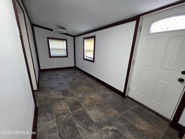 54038 Charles St, Callahan, FL 32011 - foyer featuring plenty of natural light and dark stone finish floors