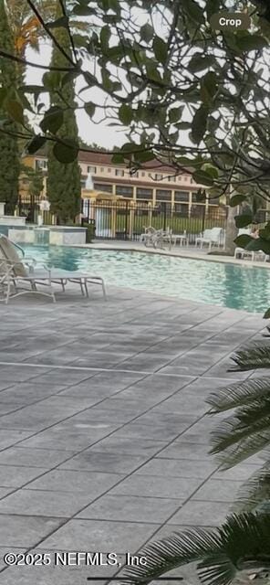 9745 Touchton Rd Unit 2522, Jacksonville, FL 32246 - community pool featuring fence