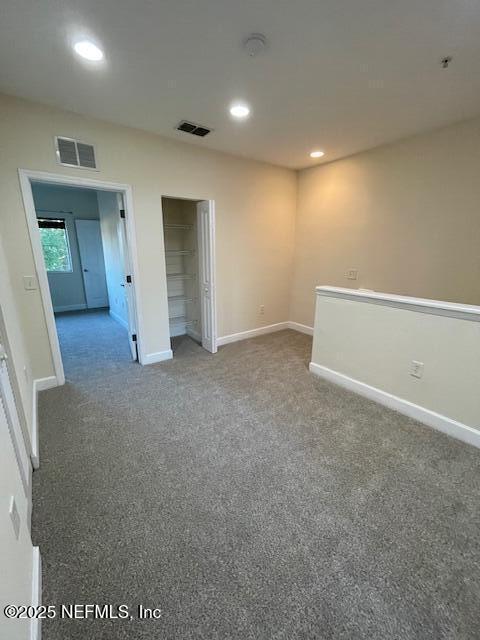 9745 Touchton Rd Unit 2522, Jacksonville, FL 32246 - carpeted empty room with baseboards, recessed lighting, and a smoke detector
