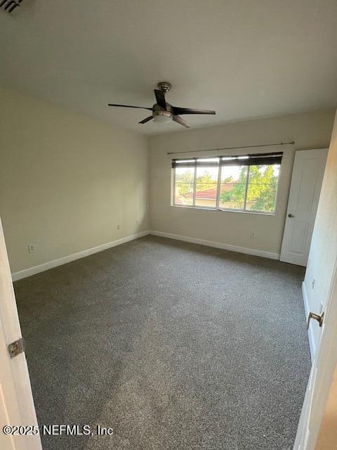 9745 Touchton Rd Unit 2522, Jacksonville, FL 32246 - spare room featuring ceiling fan, baseboards, and carpet floors