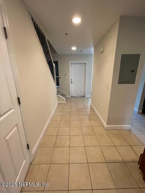 9745 Touchton Rd Unit 2522, Jacksonville, FL 32246 - corridor featuring electric panel, light tile patterned floors, baseboards, and recessed lighting