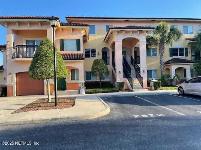 9745 Touchton Rd Unit 2522, Jacksonville, FL 32246 - view of property with uncovered parking