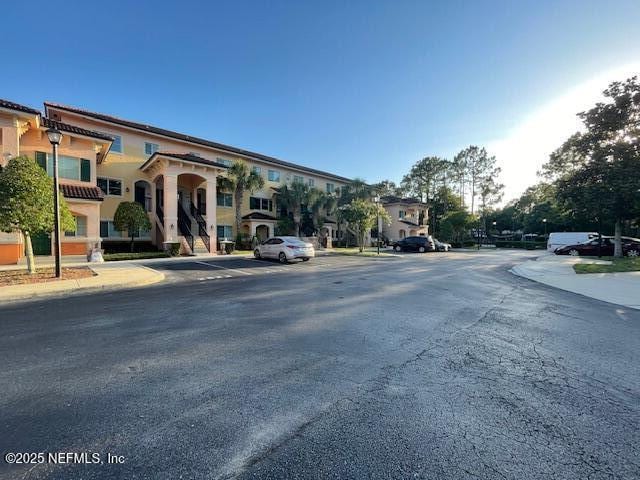 9745 Touchton Rd Unit 2522, Jacksonville, FL 32246 - view of asphalt street with street lights