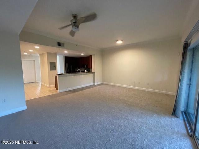 9745 Touchton Rd Unit 2522, Jacksonville, FL 32246 - unfurnished living room featuring light carpet, ceiling fan, baseboards, and recessed lighting