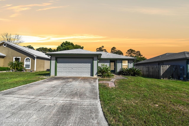 726 Calico Jack Way, Green Cove Springs, FL 32043 - view of front facade featuring a garage, driveway, and stucco siding
