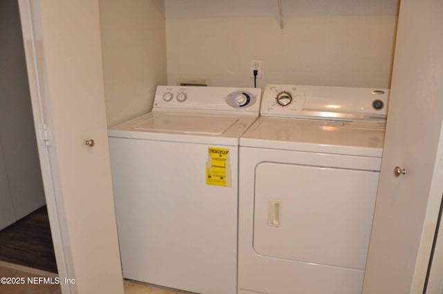 laundry area with washing machine and dryer