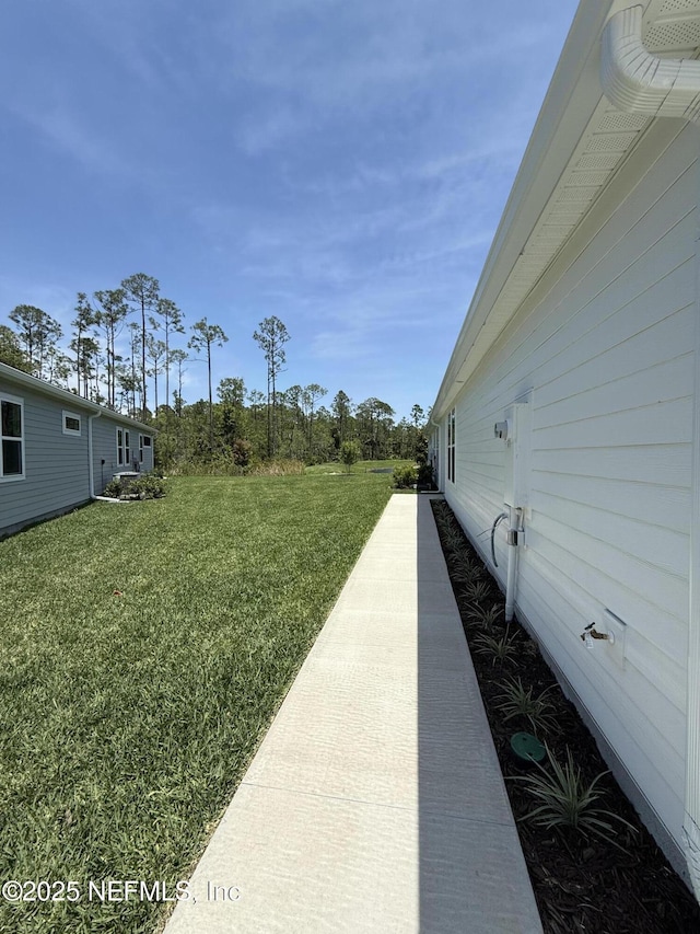 38 Mulberry Rd, Palm Coast, FL 32164 - view of green lawn