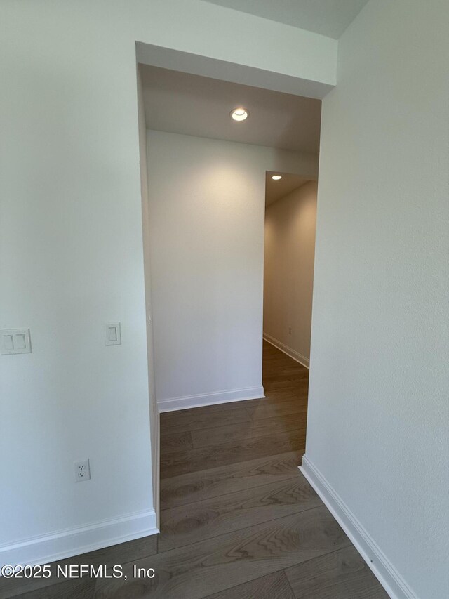 38 Mulberry Rd, Palm Coast, FL 32164 - corridor with baseboards, recessed lighting, and wood finished floors