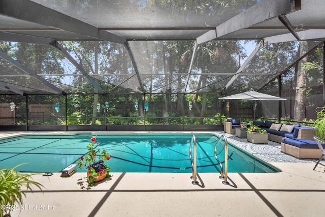 swimming pool featuring outdoor lounge area, a lanai, and a patio area