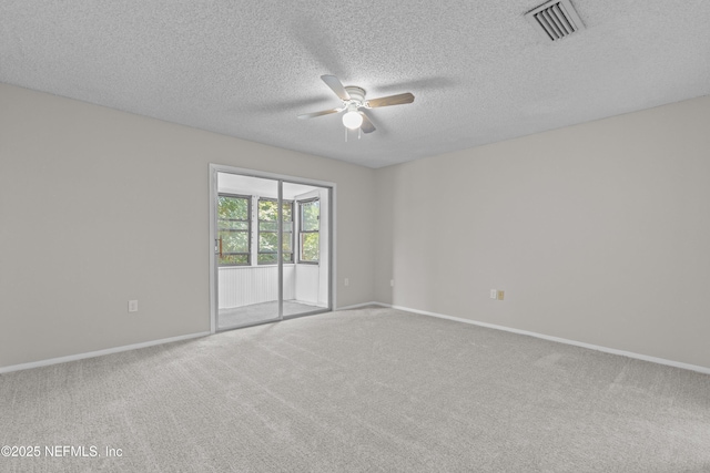 347 Greencastle Rd Unit 46, Jacksonville, FL 32225 - spare room with a ceiling fan, carpet flooring, baseboards, and a textured ceiling