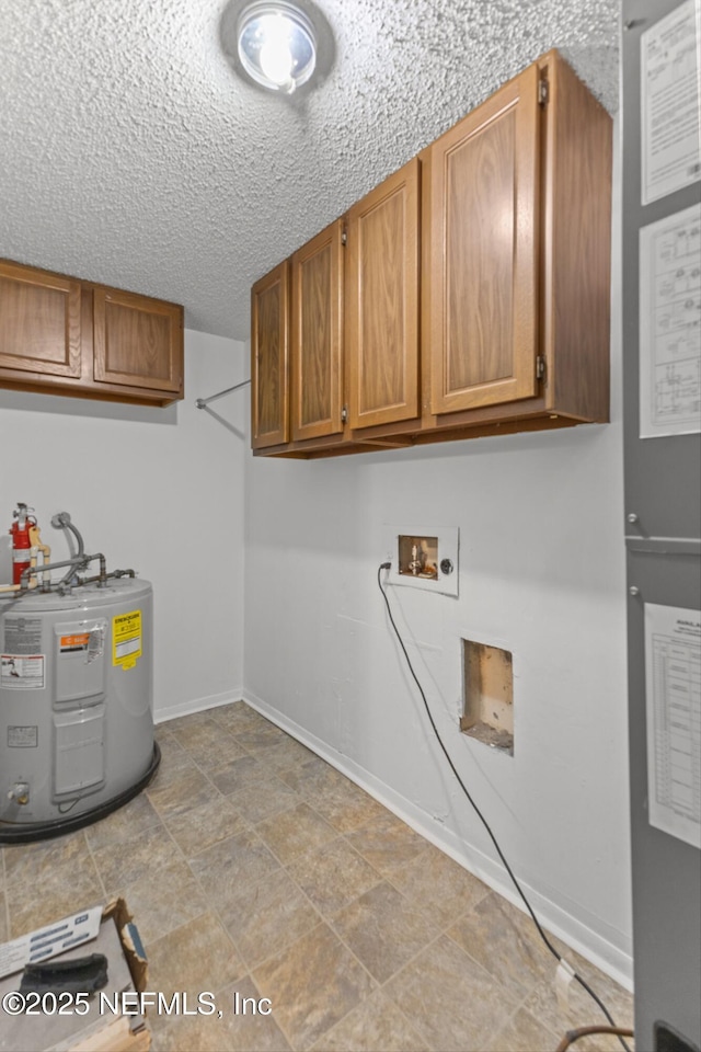 347 Greencastle Rd Unit 46, Jacksonville, FL 32225 - laundry area featuring water heater, cabinet space, hookup for a washing machine, baseboards, and a textured ceiling
