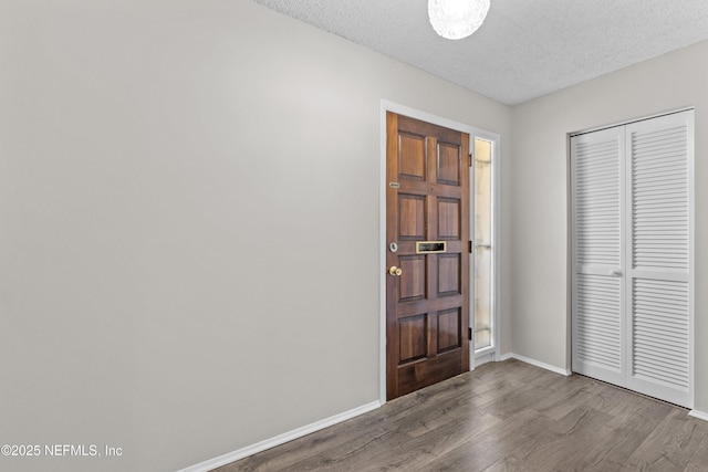 347 Greencastle Rd Unit 46, Jacksonville, FL 32225 - entrance foyer with wood finished floors, baseboards, and a textured ceiling