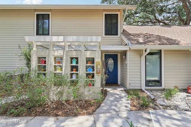 303 Vista Lagoon Ct Unit C-3, Ponte Vedra Beach, FL 32082 - doorway to property with roof with shingles