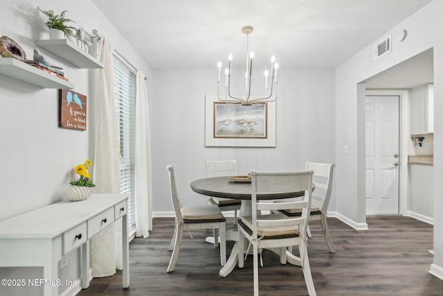 303 Vista Lagoon Ct Unit C-3, Ponte Vedra Beach, FL 32082 - dining room with a chandelier, dark wood-style floors, and baseboards